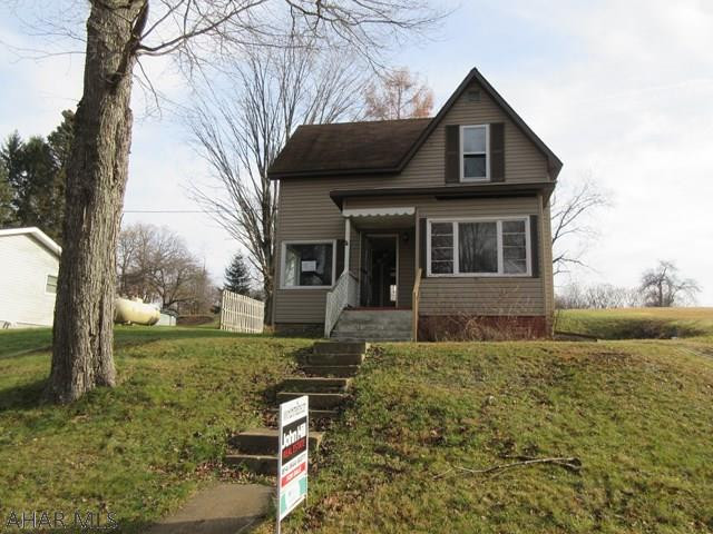 Grampian 1.5 vinyl home on 1 acre. Needs some work, but loads of potential. Living room w/ fireplace, formal dining room, eat-in kitchen. First floor laundry and updated bath, off-street parking and more. Possible 3rd bedroom on 2nd floor is captive. Property sold AS-IS. Seller will make no repairs. Offers must be submitted through HUD approved broker. Buyer pays both transfer taxes. Equal Housing Opportunity.