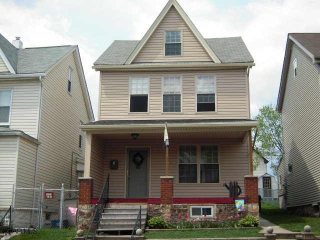 Nothing to do but move in!  This home's exterior has been completely updated with new vinyl siding and thermopane windows.  The interior has all been freshly painted with neutral colors.  Updated electric.  There are hardwood floors in the living room and dining room.  The kitchen has just received new laminate flooring, cabinets, countertops and appliances!  There is a pantry off the kitchen that could easily be converted to a 1/2 bath.  Upstairs contains 3 bedrooms (however, one has no closet.)  Great back yard partially fenced, off-street parking for 2 cars and a 1 car garage!  Low utilities! Nice area in Juniata.  Don't wait!