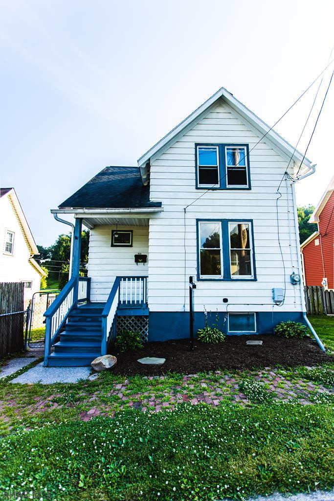 Wonderful 2 bedroom with a back yard, 2 car garage, back porch. Beautiful Hard Wood Floors. All New FRESH paint, All NEW Carpet in both bedrooms, etc. NEW kitchen flooring.. All NEW landscaping in the front and back yard. Make this house your home. Wonderful house!!!