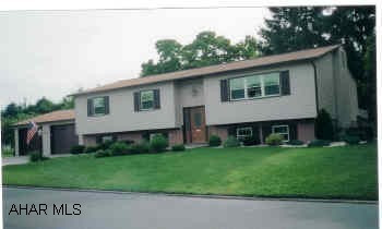 Top of the line raised ranch on corner lot. New oak custom kitchen, full finished basement, new sunroom, 35 year roof, new windows and siding, newer neutral carpeting.  Beautifully remodeled, oak woodwork throughout, 4 bedrooms, 3 full baths, guest suite in basement, newly painted interior, corian counters, all new appliances included, neutral throughout, custom window treatments included.