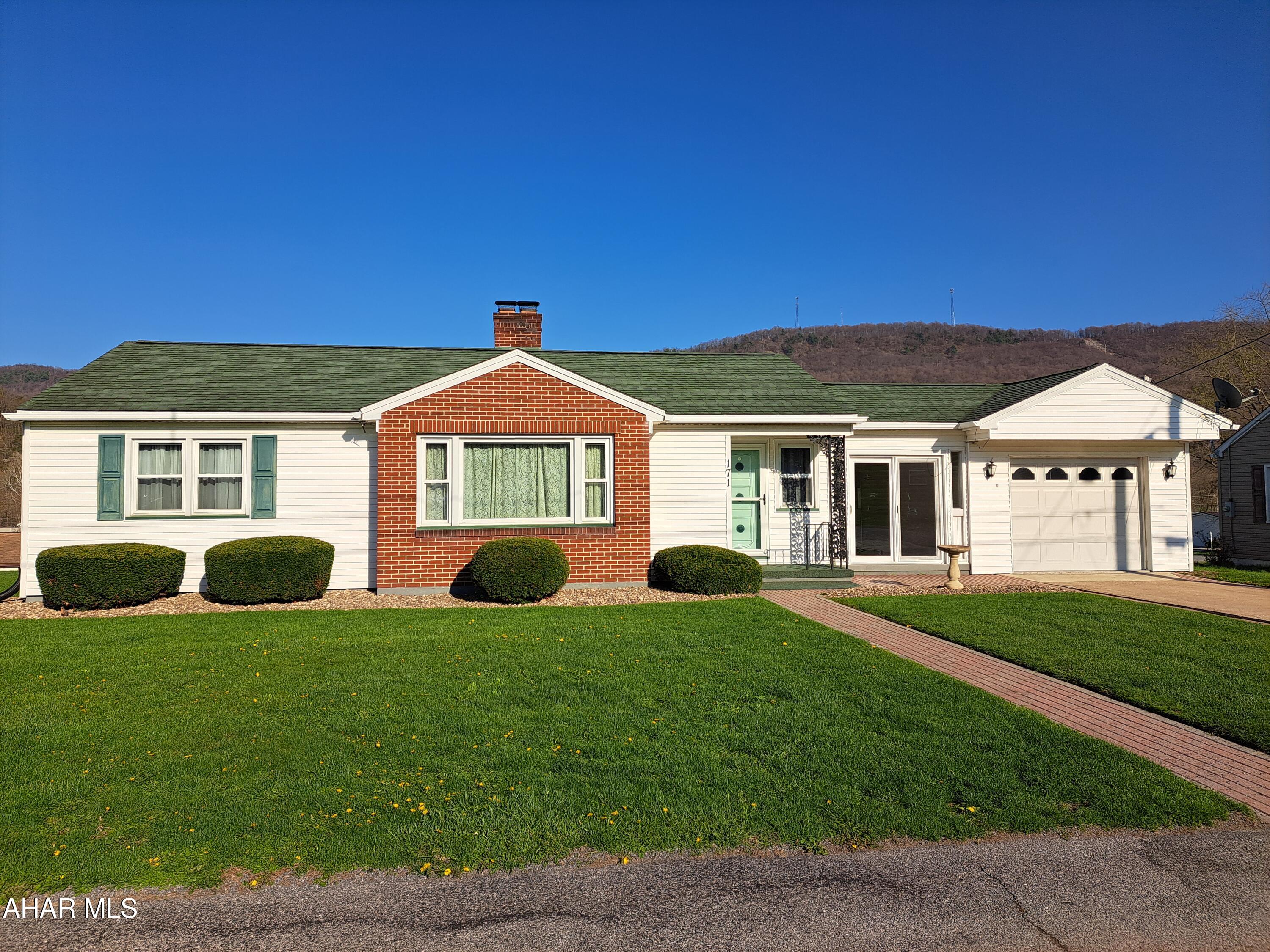 Well-maintained home in the Spring Cove School District featuring recently refinished hardwood floors, a spacious living area, dining room, and an updated kitchen with appliances included.

The finished walk-out lower level provides additional living space ideal for a family room or home office. Updates over time include windows, central air, and mechanical systems.

Exterior highlights include a breezeway, rear patio, and a detached 2-car garage, along with an attached garage for added convenience.