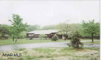 one and one half story frame on 2.8 acres Barr twp.  above ground pool 24ft.  gazebo