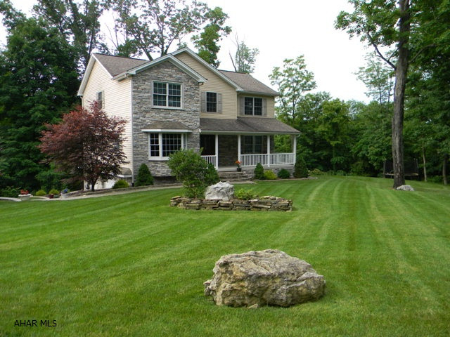 Immaculate 2-story in a wonderful location. The home offers 4-Beds, 2.5 Baths, L.R. w/FP, Kit w/break. bar, DR & Den. Master suite w/cath. ceiling, Master Bath & walk-in closet. Full walk-out bsmt w/ Family room & FP, additional 3/4 bath & laundry room. 2-car garage, Gas FA heat, Heat pump w/central air & macadam driveway. Beautiful professional landscaping includes, paver patio, fire pit, paver block retaining walls, alum. fencing & much more! Must See!