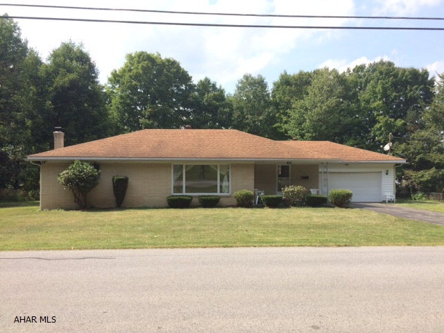 This brick ranch home sits on a beautiful large flat lot in a quiet area of Cresson.  Large updated eat in kitchen connects to the dining room, great space for entertaining family and friends.  Large garage for parking cars in winter.  Large basement with potential to finish how you want.  This brick house is much larger than it looks.  Must see.