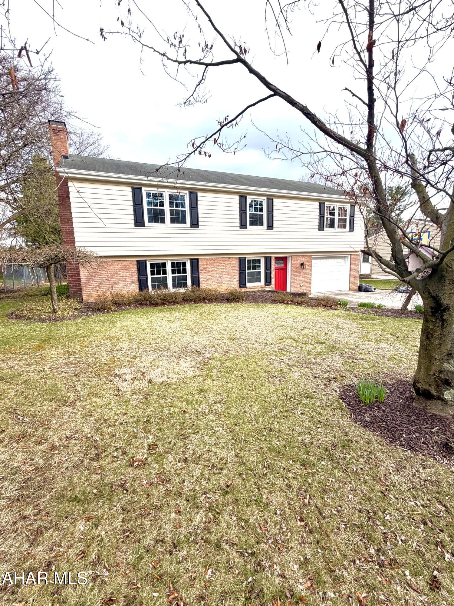 Immaculate, move-in ready home with numerous updates throughout! The main level features hardwood floors and abundant natural light. The dining room opens to an upper deck, while the eat-in kitchen offers new countertops and appliances.

The family room includes a cozy fireplace and walk-out access to a patio--perfect for entertaining. A spacious laundry room with utility sink adds convenience, and the lower level features new carpeting for additional living space.

Recent improvements include: new windows, new garage door, new interior and exterior paint, updated lighting, new entry door, and more. Enjoy the fenced-in yard for added privacy.

A must-see home!

(Buyer must verify taxes and square footage)