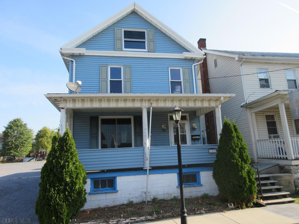 Martinsburg 2 story vinyl home. Features large living room with pellet stove, formal dining, eat-in kitchen, first floor half bath. 3 bedrooms and full bath upstairs. 2 large storage sheds and large off-street parking area to rear. Needs some work, but great location. Property sold AS-IS. Seller will make no repairs. Offers must be submitted through HUD approved broker. Buyer pays both transfer taxes. Exclusive Agency. Equal Housing Opportunity.