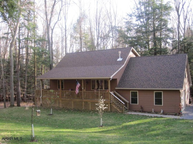 Immaculate Mountain Residence/Retreat.  Located on flat/dry 1 1/2 acres within a planned gated community.  2 story, 2-3 bedroom, 2 1/2 bathroom home.  Open floor plan, cathedral ceilings and loft area.  Beautiful oak kitchen with commercial grade stainless appliances and island.  Master bedroom suite with library/office and walk-in closet.  Guest bedroom and additional bonus room/ 3rd bedroom.  Two propane stoves.  Wrap around porch and decking.  Ready to finish walk-out basement.  Includes extra large one car garage and new storage shed.  All this and more situated near lake, fishing areas, and State Recreational Vehicle Park.  Truly a must see property!  Owner offering $3,000 seller's assist.