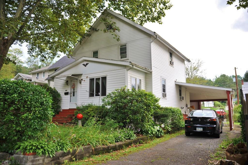 This 3 bedroom 2 bath home is spacious and well kept and ideally located on a quiet street in Toy Town!  The house has newer life proof kitchen and dining area flooring and also a newer full bath. The laundry room is conveniently located on the 1st floor!  The sunporch at the  back of the house is  where you can relax and have your morning coffee.   There is an abundance of possibilities with this home!   All it needs is your finishing touches!  Schedule your showing today! Taxes and sq footage to be confirmed by buyer.
