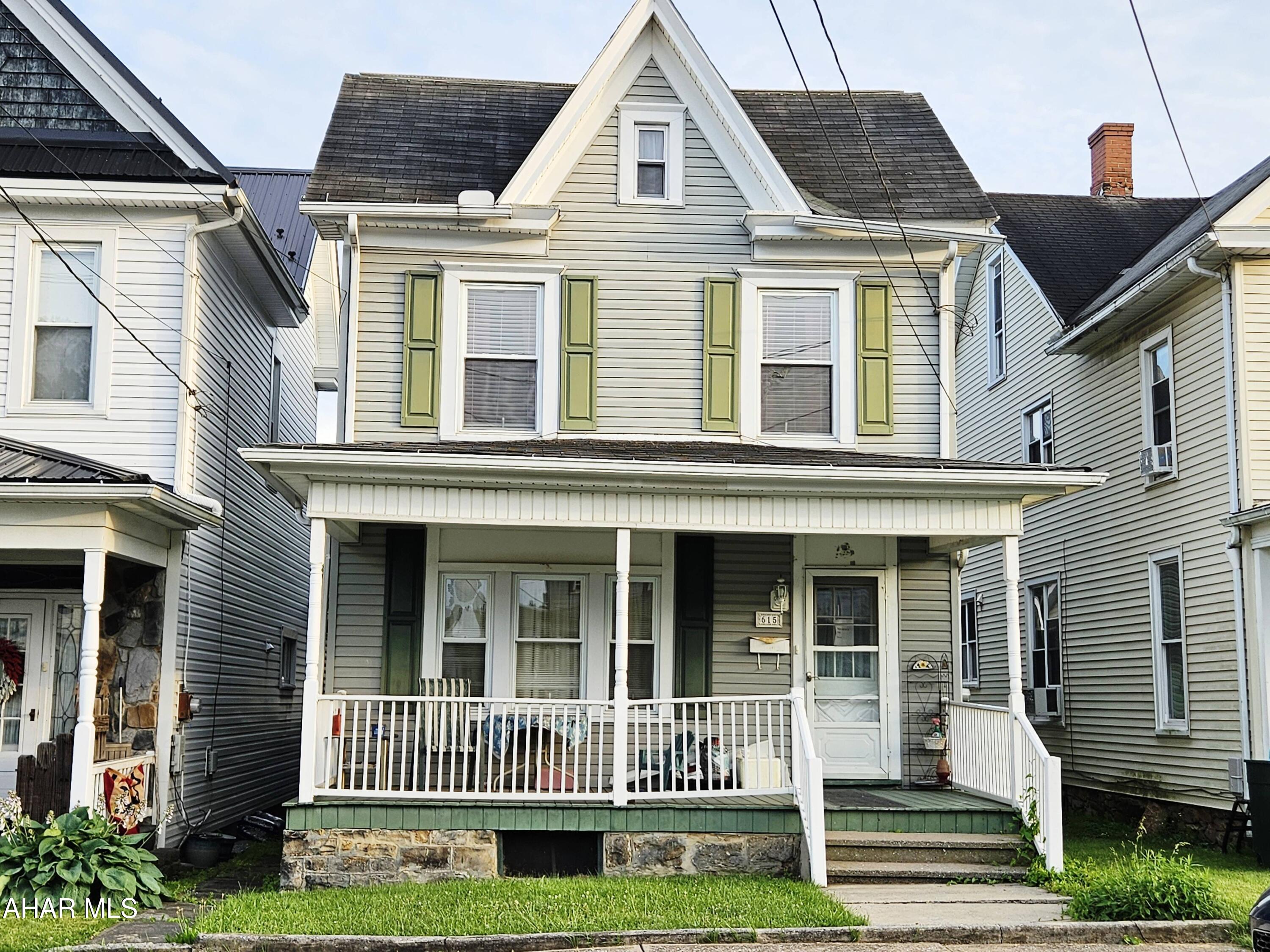 Charming older home with great bones and plenty of potential. Features include a large, updated kitchen, inviting sunroom, formal dining room, nicely sized yard, and a large block garage. This home has a great layout and character.  Make this home your own by updating the cosmetics.