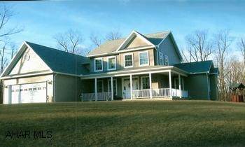 Nearly new home in Juniata Mills, very lovely with all the amenities. Nearly new 4 bedroom home in Juniata Mills. Main level master bedroom with master bath jacuzzi and walk-in closet. Gas fireplace in great room. Large rear deck, attached 2-car garage, covered front porch. 3 zones of heat.