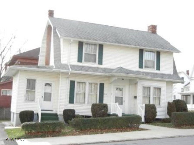 Lovely 2 story on a corner lot.  Includes all appliances, newer furnace and vinyl siding.  Hardwood under carpet.  Well cared for but needs TLC.  Great curb appeal.  Taxes are $875.88 plus $134.04 homestead tax.