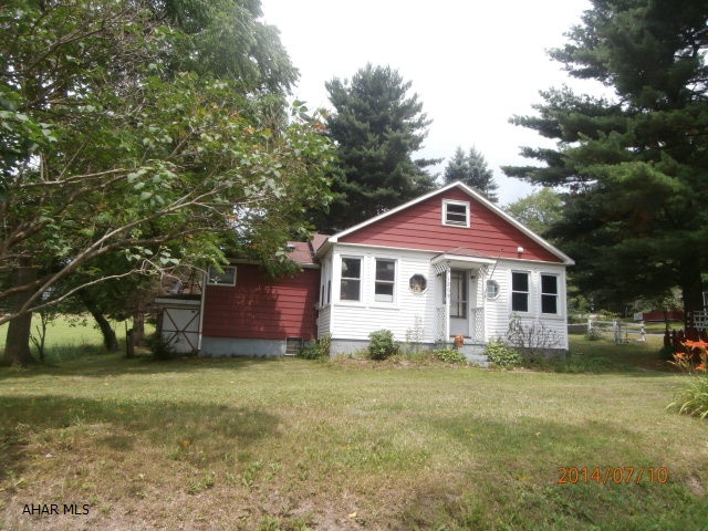 Cute bungalow in a nice country setting. Home is partially remodeled.