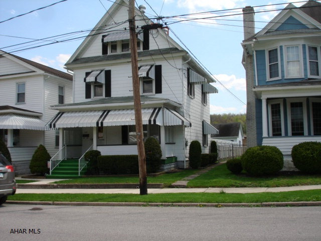 This charming property offers hardwood floors under the carpeting, central air-conditioning, private backyard, three stall garage and a lovely neighborhood.  The front and back porches are great for relaxing or entertaining family and friends.  There is a full size walk-up attic that could be finished for more square feet.  Don't miss out on this adorable property.