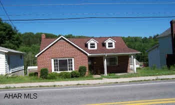 sold as is.  Cute 1 1/2 storybrick  home with 2 car garage.