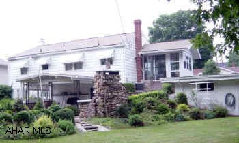 One owner. 1 story. Family room in basement - lovely landscaped yard. Sunroom off kitchen - hardwood floors under carpet on main level.