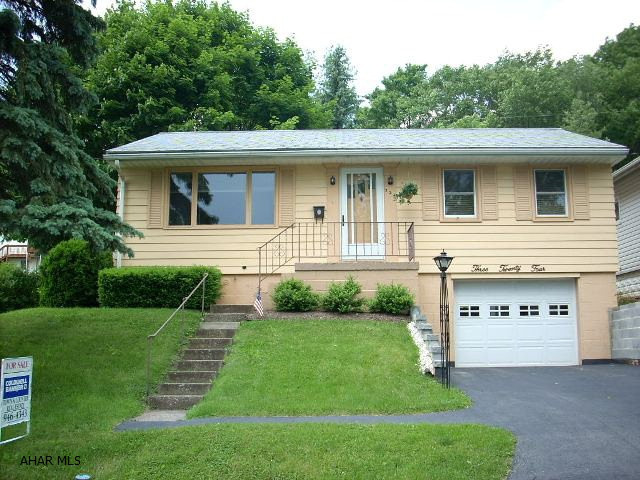 Great starter home in Pleasant Valley area! Very well maintained 2 bedroom with hardwood floors thru out.  Each bedroom offers closet space. Updated bath.  The large living room has an abundance of natural light with the large picture window.  The kitchen includes all appliances, updated countertops and newer flooring.  Extra living space is offered by the large enclosed patio! The lower level offers many possibilities!