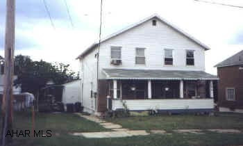 DUPLEX ACROSS FROM HIGH SCHOOL. OCCUPIED AT THIS TIME (2-TENANTS). 2-BR, 1-BA, LR, DR, KIT IN EACH SIDE. 2-FURNACES, 2-HW HEATERS.