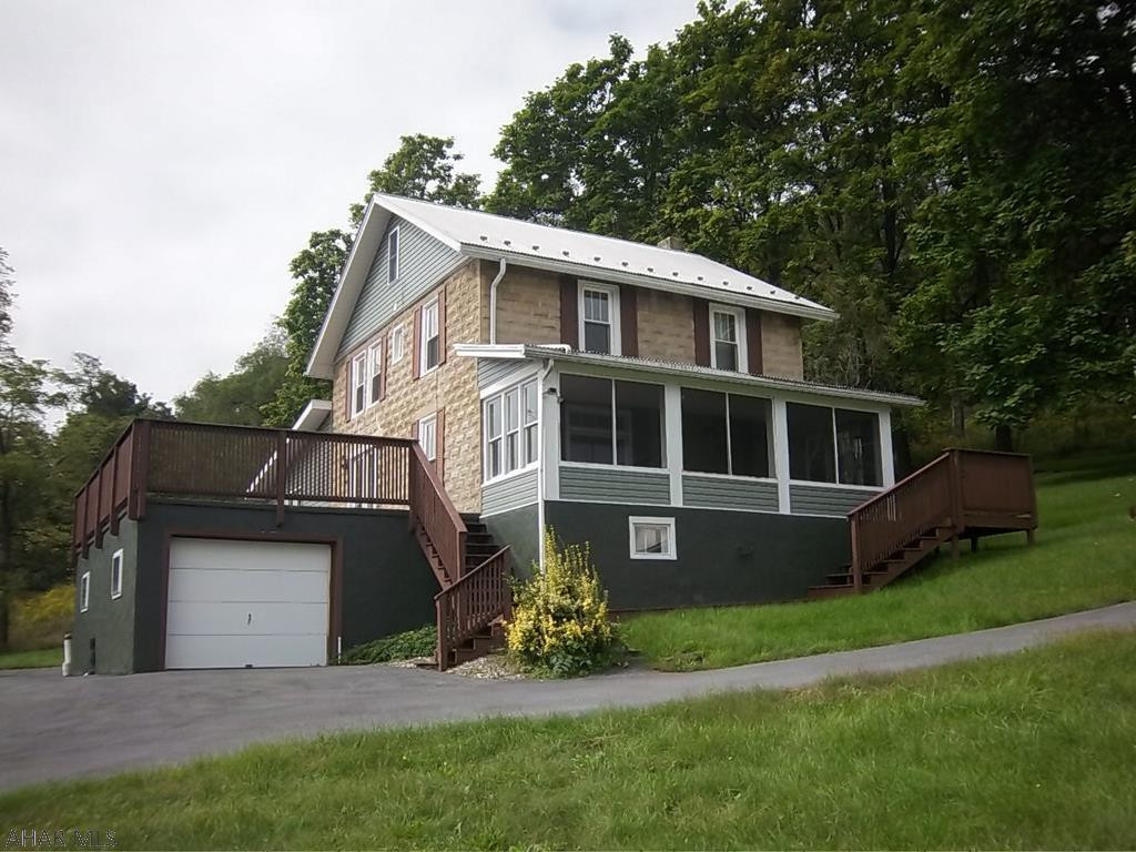 Abundant views from this 3 BR, 3 BA home in Hollidaysburg School District. Lots of room outside and inside this great home on a private setting. Tons of storage throughout. Call and schedule an appointment to see what this home has to offer.