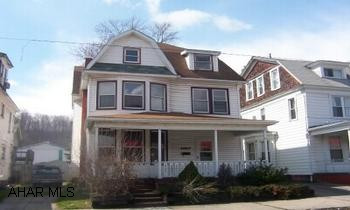 Nice 2.5 Story, large rooms, hardwood floors, beautiful oak woodwork, stair case and pocket doors.  Call Bonnie 942-2172. Nice 2.5 Story, large rooms, hardwood floors, beautiful oak woodwork, staircase and pocket doors, beautiful stain glass window, all newly remodeled, oak kitchen, 1st floor laundry and .5 bath, privacy fenced yard, deck, 4 rooms and walk in closet in attic.  Being sold As Is.  Call Bonnie 942-2172.