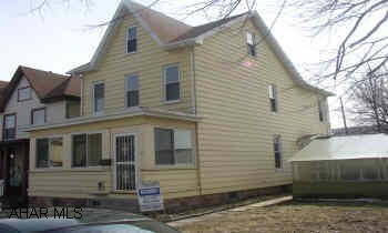 2 STORY FRAME. BEAUTIFULLY REMODELED TWO STORY.  LOVELY OAK KITCHEN WITH CERAMIC TILE, UPSTAIRS BATH REMODELED WITH CERAMIC TILE.  ALL NEW CARPET AND FRESHLY PAINTED.  LIKE NEW!  IT IS SUPER.