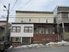 Five unit apartment building with detached garage/loft. Above average condition with all units currently rented. Good rental history. Coal and oil heat - a tenant currently fires the coal boiler in exchange for rent discount.