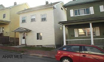 Newer  vinyl siding, shingled roof and windows.  Needs work inside.  SOLD AS IS WHERE IS.
