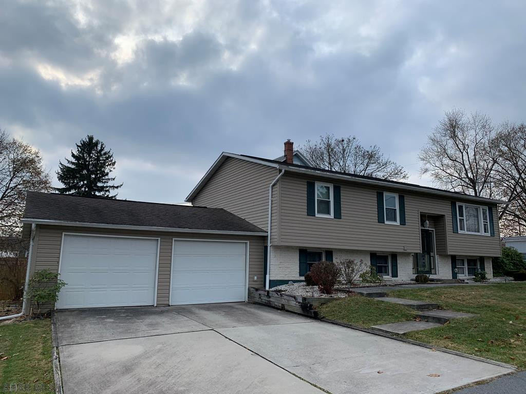 You will love this corner lot single family home! Enjoy the brightly lit eat in kitchen and glass shelving in the living room. This home also offers a finished basement with a bar that would be perfect for a man cave/family room! Come make this house your home!