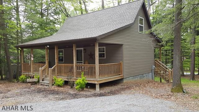 Beautiful, cozy, cabin for sale in Glendale Yearound. This 2 bd. and 1 ba. cabin is practically brand new. Fully furnished and ready to use. Gas heating stove with stone backing beautifully accents the living room. Full basement is unfinished with room for storage or could be finished for more room. Perfect for that weekend getaway or even permanent residence. Glendale Yearound is a gated community minutes from Glendale Lake and Prince Gallitzin State Park.