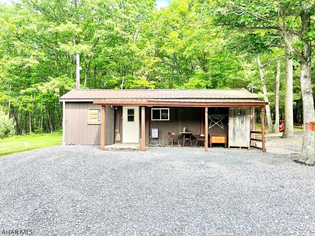 Getaway in the Mountains with 38+/- acres located a short distance from PA State Game Lands. Property consists of a small cabin, septic, two wells, custom built tree stands, pond, and much more! This property is a great location to getaway from the hustle and bustle and would also make a nice location to build your dream home or getaway.