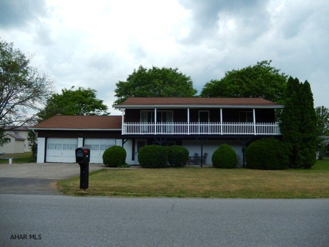 Highly sought after Antis Township location! This raised ranch is in a terrific location and offers 3-4 bedrooms, 2 baths, a fully finished lower level! Oversized 2 car garage! There is potential to use the property as a rental with a full kitchen on each floor.