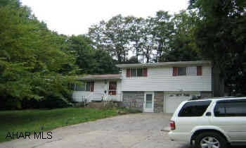 Large home on a large lot surrounded by trees. Features 3BR, 3BA, finished basement could be 4th BR. Large EI kitchen. Too much to mention. This is a must see. Great floor plan. Plenty of storage. sunroom, pool & patio are great for outside entertaining. Large shed w/garage door & storage loft.