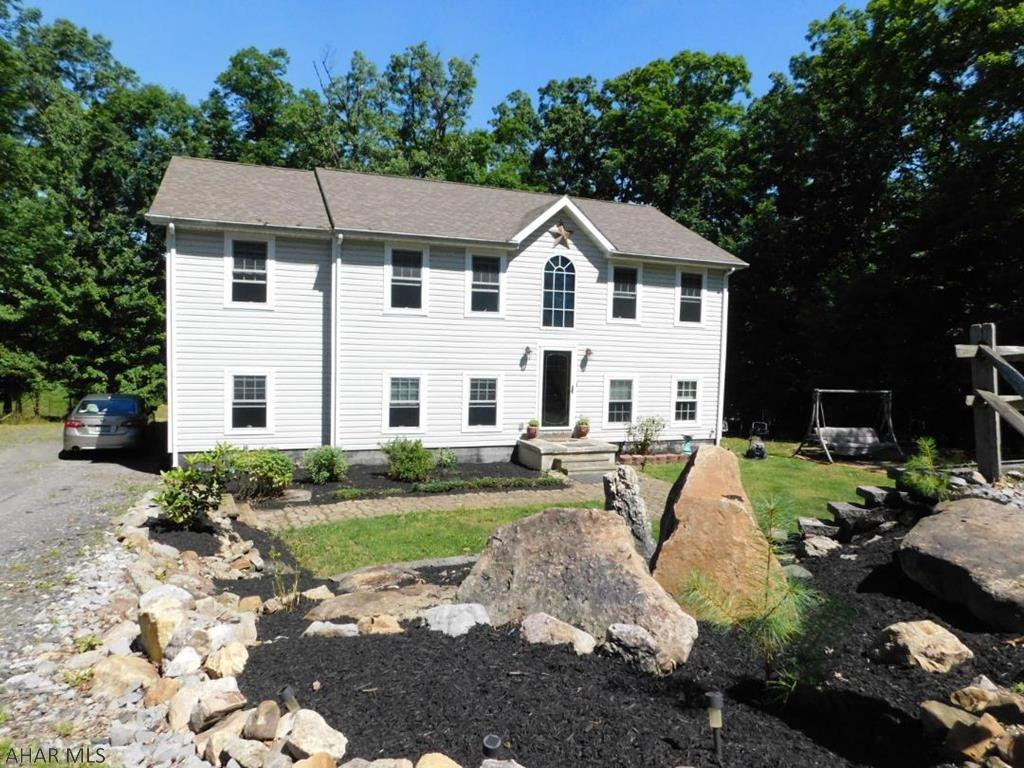 This large family home offers great space.  A theatre room (wired and ready), a built-in gun safe to keep all of your guns secure, a large lot w/2-car garage & loft all in Logan Township - Bellemeade.  Fresh paint and carpet will make it perfect with your personal touches.