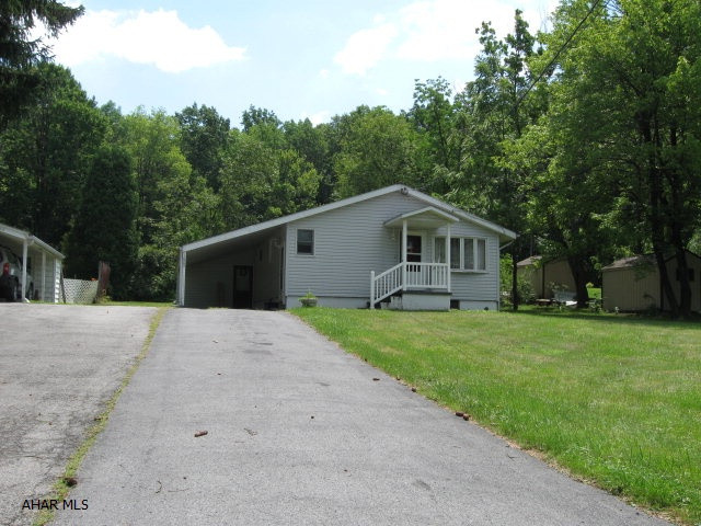 Darling 3 bed ranch on lovely .25 acre lot in Greenwood.  Nicely updated with vinyl siding, windows, newer kitchen and bath.  Large carport with storage area.
