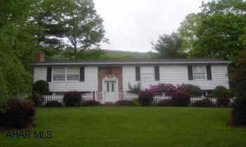 Move right in and enjoy this lovingly maintained and improved 4 bdrm, 2.5 bath bi-level. Interior features dining room, formal livingroom, family room on lower level w/fireplace insert, 3 bdrms up and 1 down. Private and serene setting. Quality throughout this impecabbly maintained bi-level with a private and serene setting!  Over 1860 square feet of l iving - comfortable family room with fp insert, formal livingroom, dining room exits to wisteria-covered patio. Kitchen has handmade island and nwr flooring. Remodeled baths, 6 panel pine doors, ceramic flooring. Handmade white picket fencing, trelisses, pond, and exceptionally well planned perennial gardens.  You must see this beauty!!  Seller giving $1,000 bonus if contract entered by 6/30/2006.