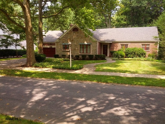You will want to be on this street. Beautifully landscaped. Perfect floor plan. 4 doors from Baker Mansion and around the corner from Mansion Park. Secluded back yard with covered porch. The seller will provide buyer a 1 year home warranty policy at closing. Seller installing new furnace and new central air.