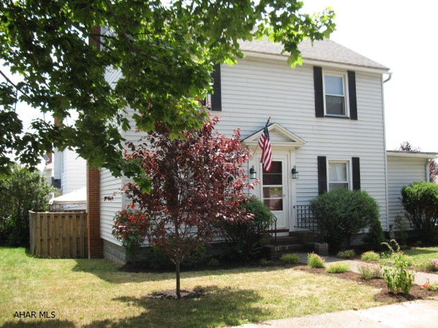 GREAT AREA! CALVERT HILLS/WHENWOOD SELLER INSTALLING A NEW AMERICAN STANDARD FURNACE! Lovely 3 bed colonial on corner lot in near campus.  Sits on dead end street so little traffic. Fenced and tiled courtyard with garden canopy is great for B-B-Q! Newer kitchen has breakfast bar and pass through to formal dining room.  Large living room and bonus room for office or family room.  Newer bath. Dual Heat System! Brand New American Standard furnace PLUS Heat Pump for Central Air and to reduce heating costs, vinyl siding and windows. NEW CARPETING TO BE INSTALLED IN ONE BEDRM AND FAMILY RM DOWNSTAIRS.  FRESH PAINT, 3 NEW WINDOWS AND SOME REPAIRS DONE IN SEPT-OCT. MOVE IN READY!