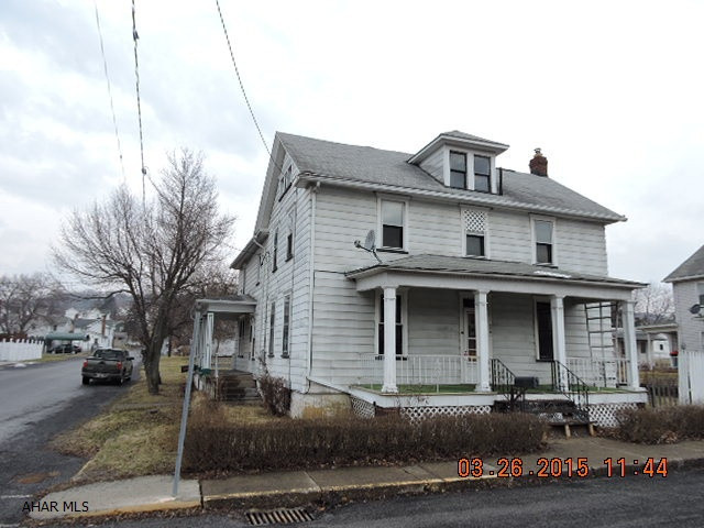 Double home can be used as single family.  2nd floor connects the 2 halves together. As a double home it has separate entrances & separate basements, 2 furnaces, 2 electric entrances, & 2 hot water tanks.  330 W 22 Street is 2 bedroom, 1 bath.  2201 Lincoln Ave is 3 bedroom, 1.5 bath, living room. dining room, & kitchen.  Live in one side & rent the other.  Large lot w/2 c garage.
