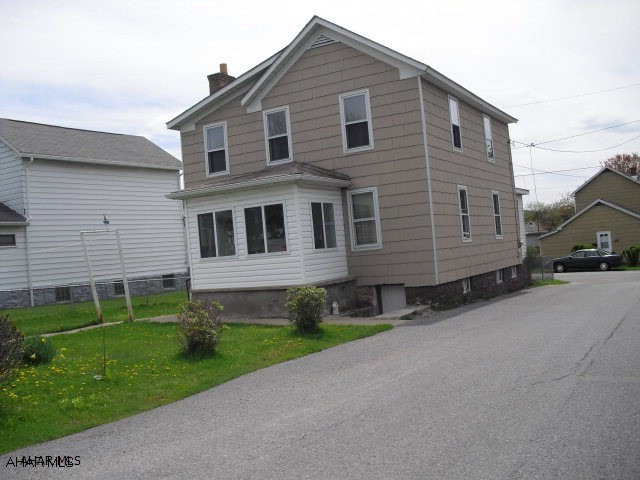 Large two story on corner lot, newer kitchen, new 1st floor bath, corner, large detached garage, absolute move in condition