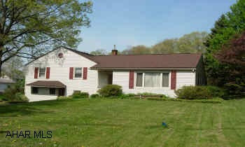 LOWER BRUSH MT. RD. PLASTER WALLS, PERGO FLOORS, LARGE COVERED DECK. MAIN FLOOR LAUNDRY.