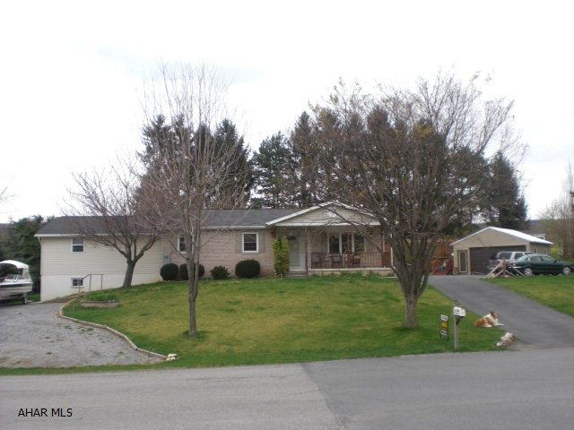 Spacious rancher on large (double) lot located in a lovely development in Tipton.  Finished basement (Man's Cave!) with room for a pool table.  Private entrance to the basement could be added for access from the gravel driveway to make a rental.  Plumbing is in place for an additional laundry room on the first floor.