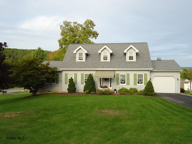 Adorable house in Logan Twp.  Could be 2 or 3 Bdrm. house.  Main floor offers Kitchen, DR, Living Room, Half Bath and Bdrm. or Family Room.  2nd flr. has 2 Bdrms and Full Bath.  Corner lot, covered deck.  New roof + windows.