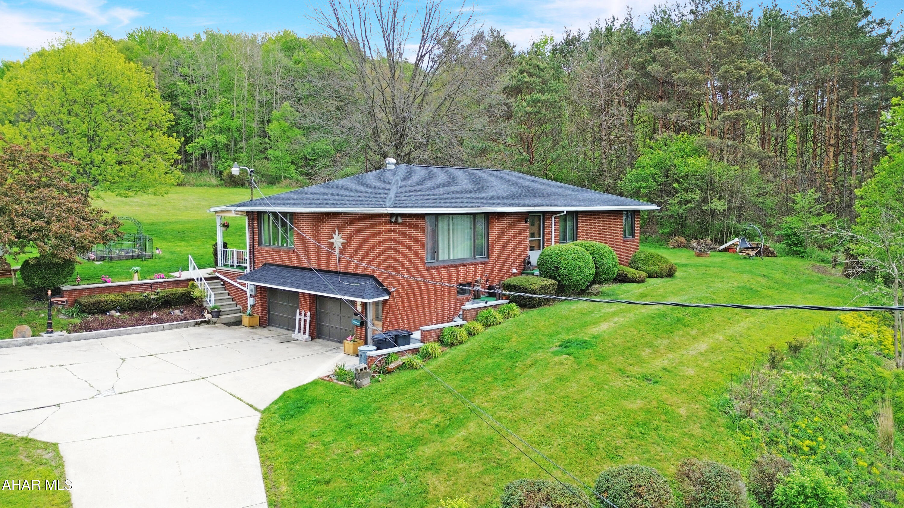 Welcome to 3015 Graham Avenue in the Windber School District! This beautifully maintained all-brick ranch style home is perfectly positioned in a desirable location overlooking town and offers comfort, space, and numerous recent updates throughout. Notable improvements include a brand new roof, updated flooring, french drains, sump pump system, and much more for added peace of mind. The main floor features a spacious sun-filled living room, large dining area, well appointed kitchen with ample cabinetry, convenient main floor laundry, an updated full bathroom, 3 nicely sized bedrooms, and an additional full bathroom. The lower level offers a cozy finished family room perfect for entertaining, a half bathroom, abundant storage space, and a large 2 car integral garage. Outside, enjoy a spacious yard, storage shed, enclosed sunporch, retractable awning, and so much more. Don't miss your opportunity to own this well cared for home in a fantastic location. Call today for more information or to schedule your private tour!