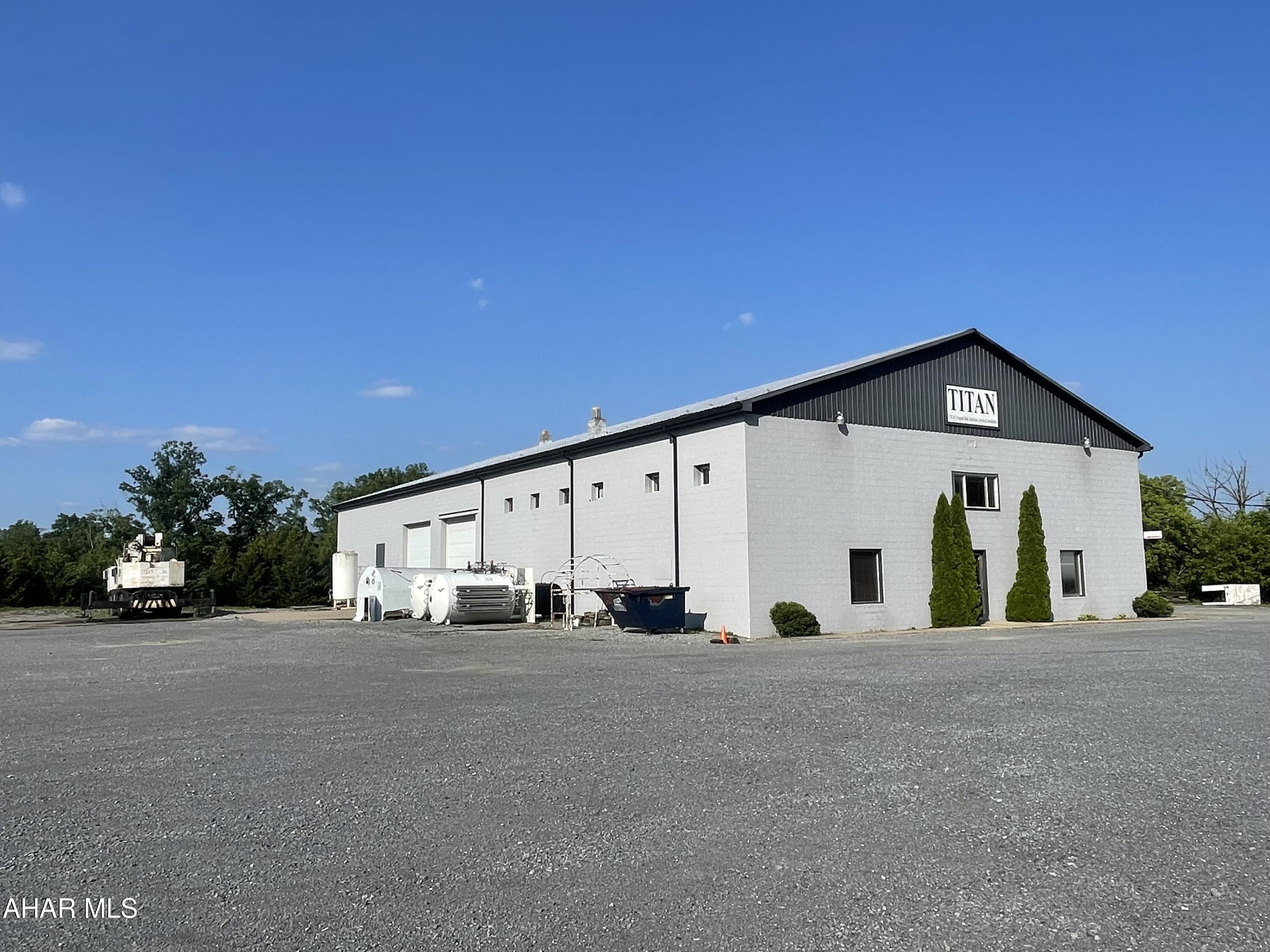 Location!!! Route 22 frontage on this 9 bay garage. Reception area. 4 private offices. 2 of the 4 offices overlook garage area. Restroom. Central air in the office space.  Breakroom over looks garage area, 5 bays and storage area with heat. Bathroom and wash area. 4 bays in rear of building. 2.08 acres! This building is larger than it appears. It's a must see for your business!!