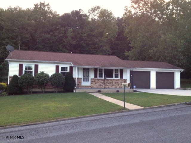 This super 3BR/1.75BA ranch in Tyrone is a must see! Sits in a private area yet close to I-99 access. Offers electric baseboard heat along with a newer heating system for oil forced air, central air, newer windows and sliding door. The kitchen offers eat-in area and a pantry that was converted for a stack-able washer & dryer. Over sized 2 car garage is insulated and has attic storage. Full basement that could be finished has rough-in for a half bath also laundry hook-ups. Sits on a large corner lot with woods in the back.