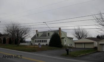 2 story vinyl sided home with 2 car det. garage & workshop. new kitchen, large lot