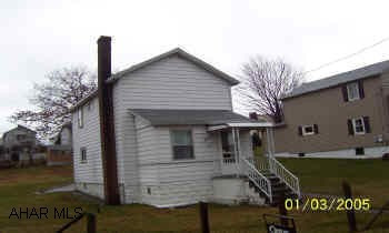 Two story aluminum sided 2 bedroom well maintained home on corner lot.