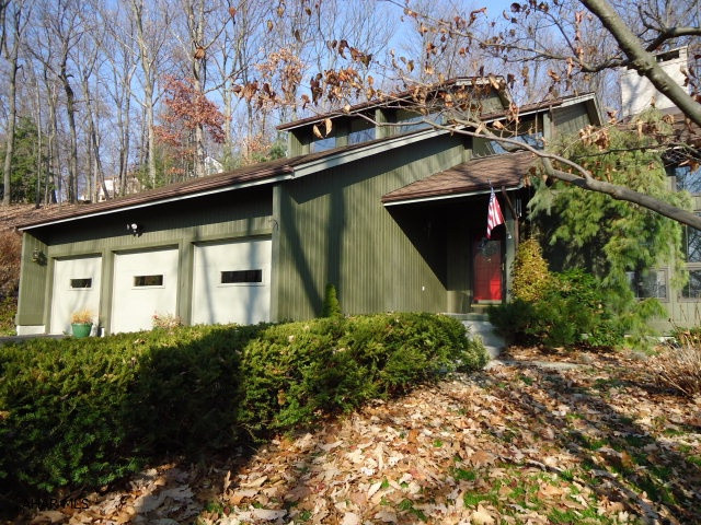 Well built 2 story contemporary with hardwood and ceramic floors, inviting oak curved staircase in the large foyer. Nice kitchen with island seating open to family room. Formal DR w/hardwood floors, laundry on main level - master suite with deck and large master bathroom - 3 car garage.