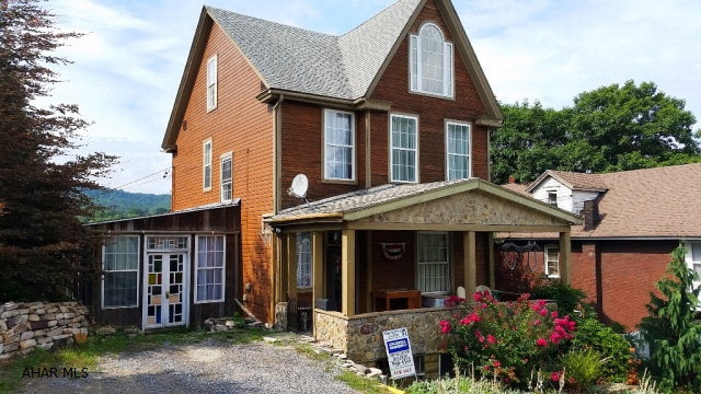 The house was rewired, replumbed, redrywalled and insulated 10 years ago. 25 new windows. Large bedrooms with walk in closets. Siding is stained. Yard is professionally landscaped including many unusual and rare trees and shrubs. A small Japanese garden, knot garden and a dwarf conifer garden. Structure is magnificent. Small in ground pool repainted & ready for use that has a new pump.