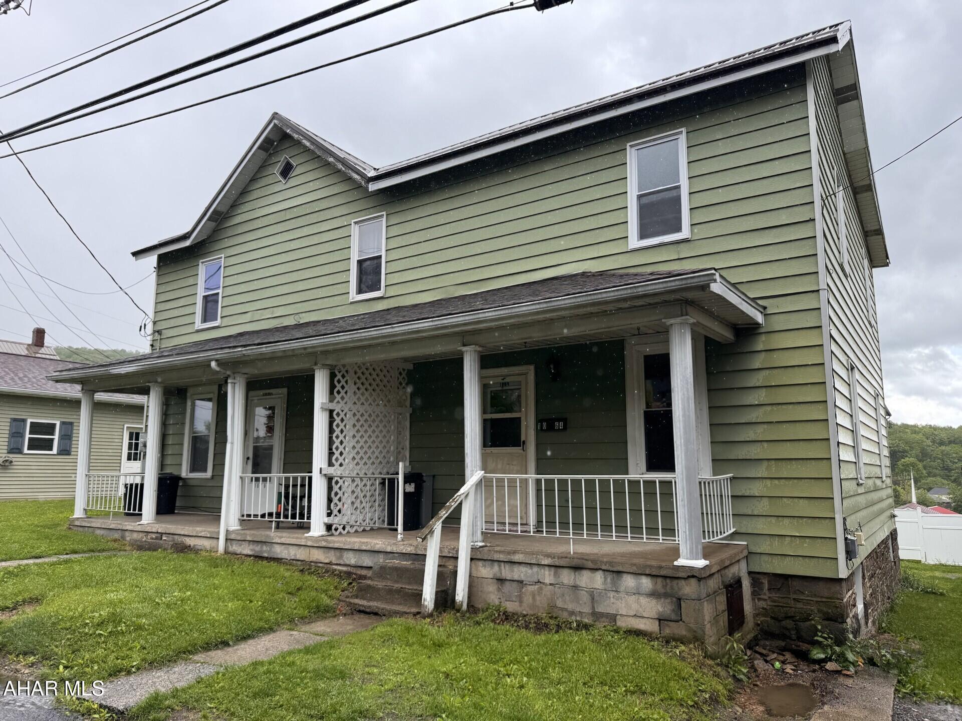 Each side has 3 BR's & Bath, LR, DR, & Kitchen.  Live in one side and rent the other side to help with the mortgage payment OR have a 2 unit great investment property.