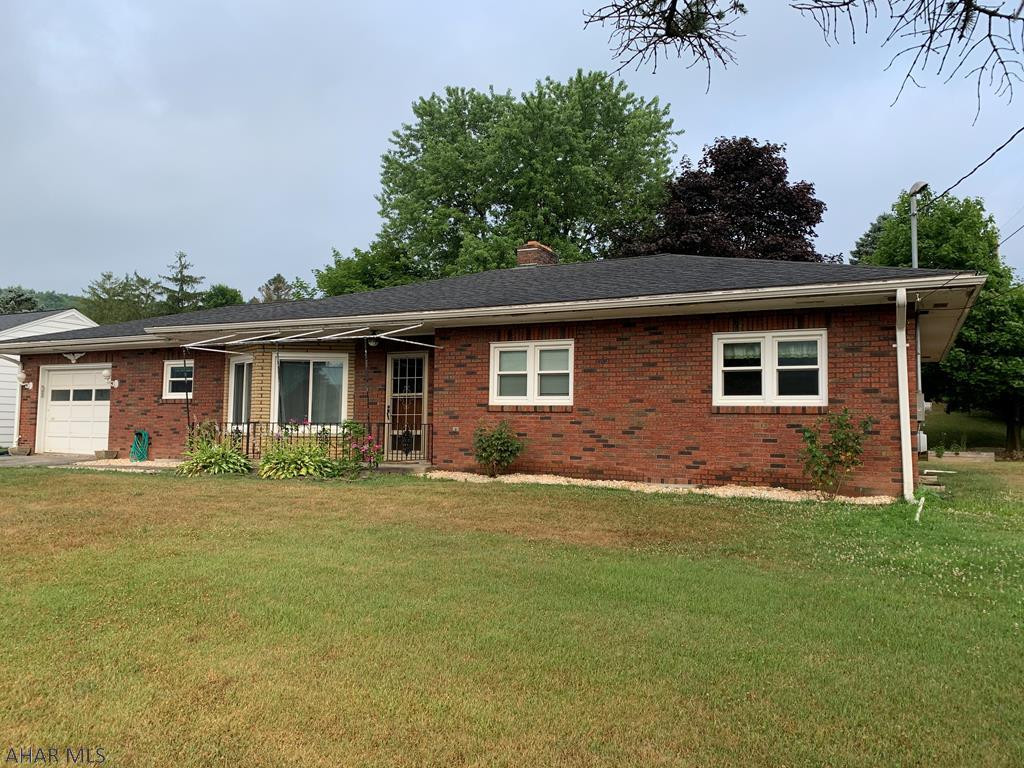 Get your hands on this beautiful single story, 3 bedroom 1 bathroom home. This brick ranch style home offers a spacious corner lot, hardwood floors throughout, updated bathroom, single car garage, and first floor laundry. The back deck is great for grilling and the patio area offers a wonderful place for entertaining friends and family. Don't miss this opportunity.